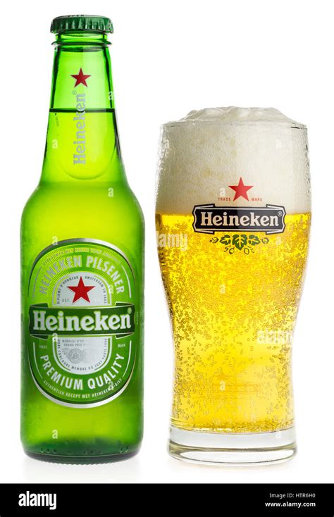 Botella y vaso de Heineken